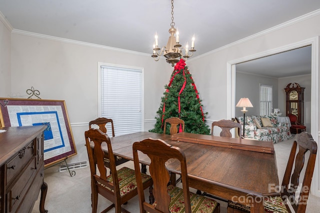 1058 General Hoke Dr, Lincolnton, NC 28092 - dining space featuring visible vents, a notable chandelier, light colored carpet, and crown molding