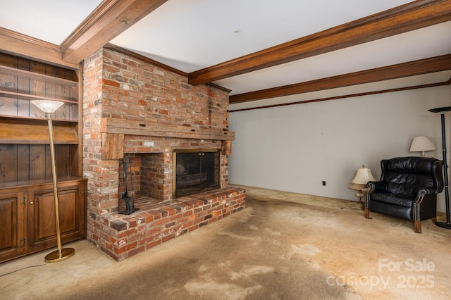 1058 General Hoke Dr, Lincolnton, NC 28092 - unfurnished living room featuring a fireplace, carpet flooring, beam ceiling, and ornamental molding