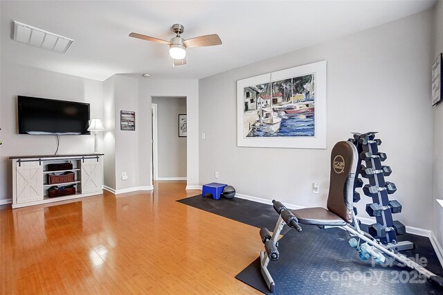 13610 Aldenbrook Dr, Huntersville, NC 28078 - exercise area featuring ceiling fan, baseboards, and wood finished floors