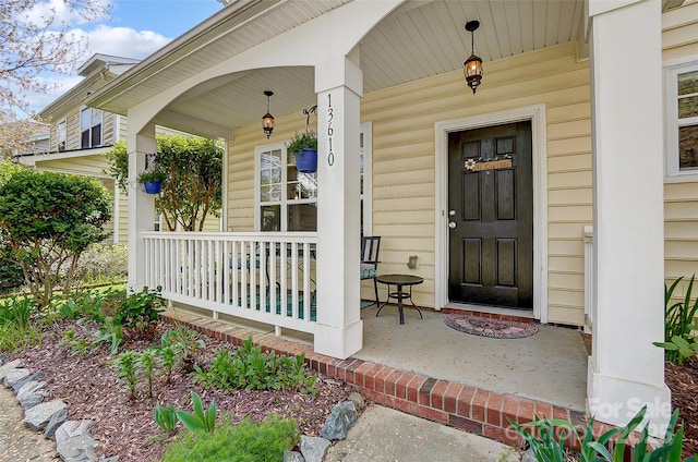 13610 Aldenbrook Dr, Huntersville, NC 28078 - doorway to property featuring a porch