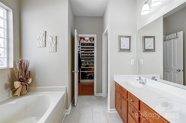 13610 Aldenbrook Dr, Huntersville, NC 28078 - full bathroom featuring healthy amount of natural light, tile patterned floors, a bath, and double vanity