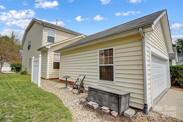 13610 Aldenbrook Dr, Huntersville, NC 28078 - back of house with a garage and a yard