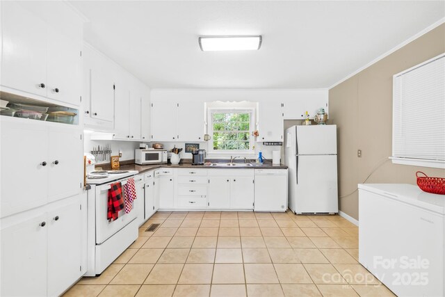 1204 Meadowood Dr, Shelby, NC 28150 - kitchen with white cabinets, white appliances, a sink, and dark countertops