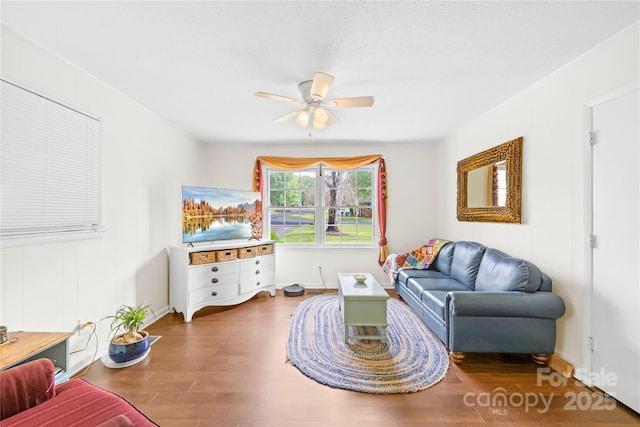 1204 Meadowood Dr, Shelby, NC 28150 - living area featuring baseboards, wood finished floors, and ceiling fan