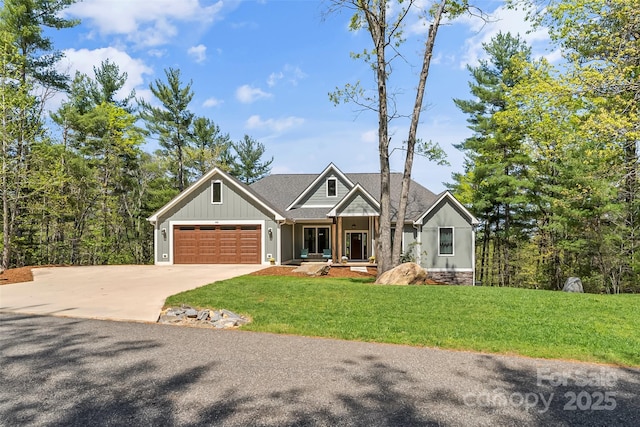 44 Sycamore Dr, Nebo, NC 28761 - craftsman inspired home featuring a garage, driveway, board and batten siding, and a front lawn