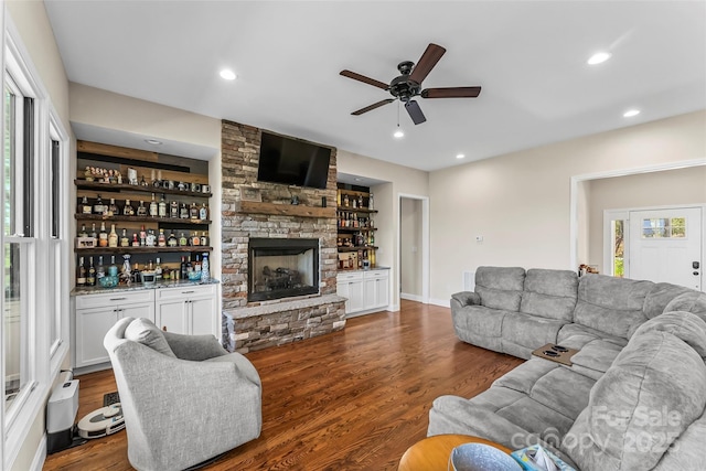 44 Sycamore Dr, Nebo, NC 28761 - living room with a ceiling fan, a stone fireplace, recessed lighting, a bar, and dark wood-style floors