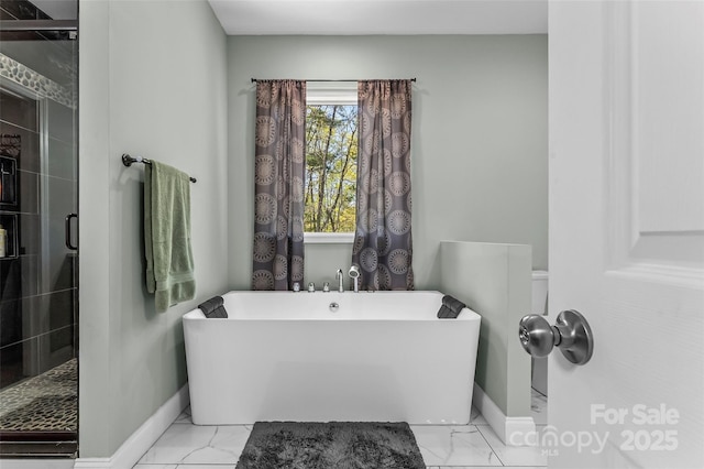 44 Sycamore Dr, Nebo, NC 28761 - full bathroom featuring a shower stall, a freestanding bath, marble finish floor, and baseboards