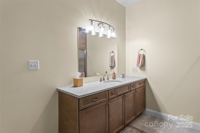 44 Sycamore Dr, Nebo, NC 28761 - bathroom featuring tile patterned floors, vanity, and baseboards