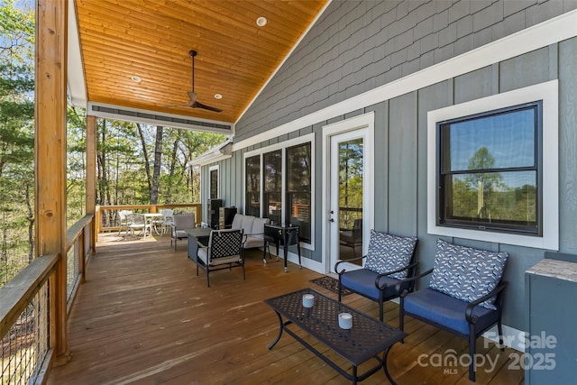 44 Sycamore Dr, Nebo, NC 28761 - wooden deck with ceiling fan and an outdoor hangout area