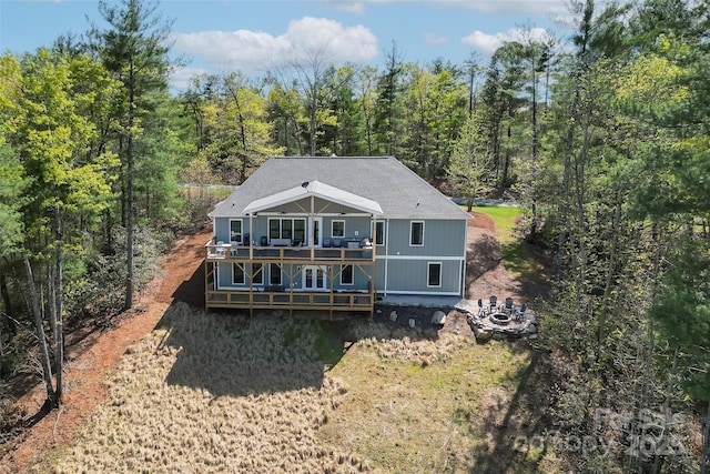 44 Sycamore Dr, Nebo, NC 28761 - back of property with a wooded view and a wooden deck
