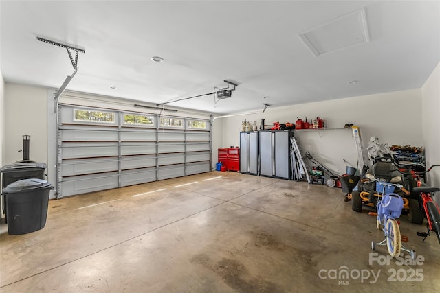 44 Sycamore Dr, Nebo, NC 28761 - garage featuring a garage door opener