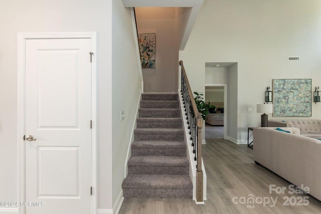 1465 Mocksville Hwy Unit 20, Statesville, NC 28625 - stairway with visible vents, baseboards, and wood finished floors