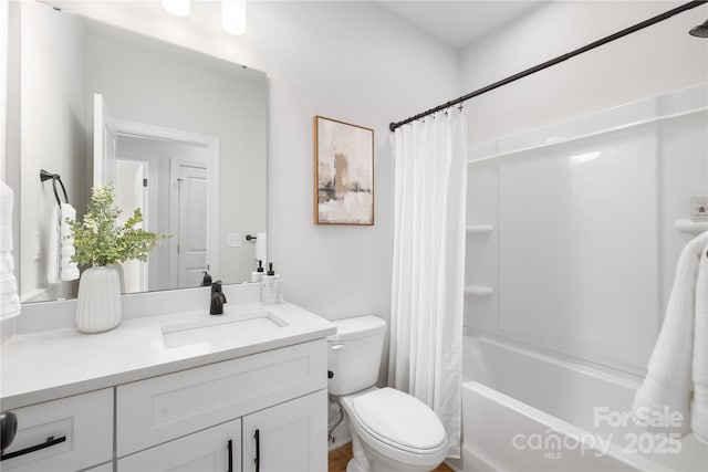 bathroom with toilet, shower / tub combo with curtain, and vanity