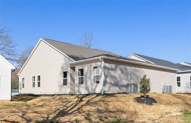 view of side of home featuring cooling unit