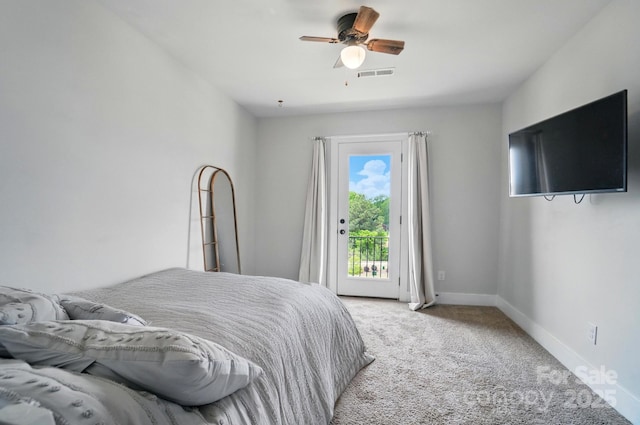 carpeted bedroom featuring access to outside, baseboards, visible vents, and a ceiling fan