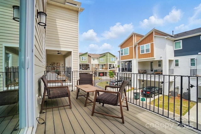 wooden deck with a residential view