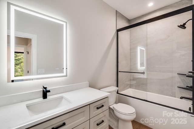 175 Silverglen Way, Hendersonville, NC 28792 - bathroom with toilet, combined bath / shower with glass door, and vanity