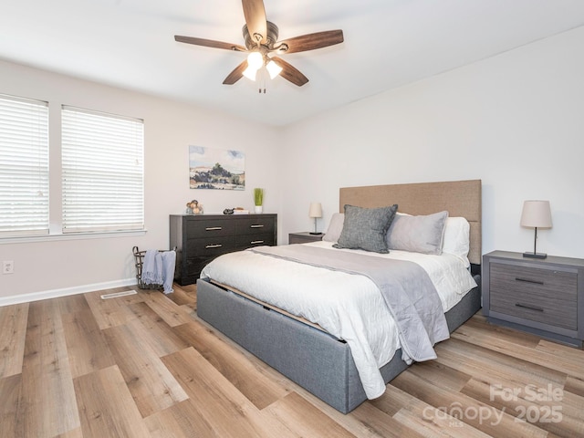 1203 Maple Shade Ln, Charlotte, NC 28270 - bedroom featuring light wood-style floors, baseboards, and a ceiling fan