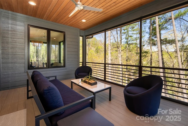 sunroom / solarium with ceiling fan