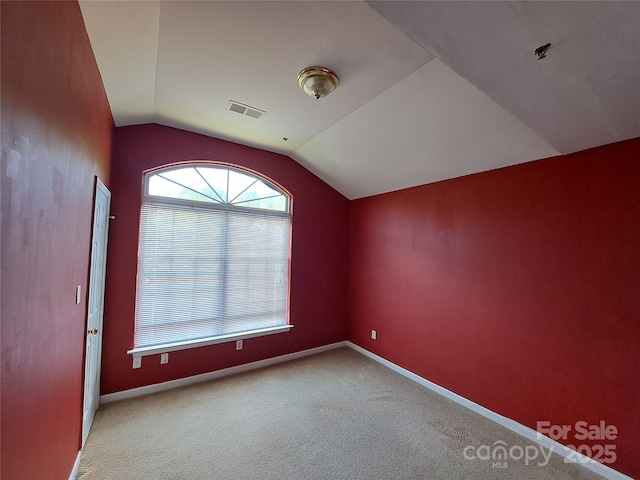 2527 Carya Pond Ln, Charlotte, NC 28212 - bonus room featuring carpet, baseboards, vaulted ceiling, and visible vents