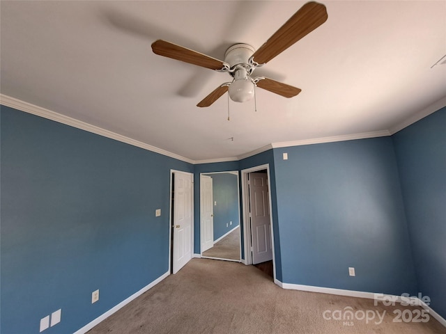 2527 Carya Pond Ln, Charlotte, NC 28212 - unfurnished bedroom featuring crown molding, baseboards, a ceiling fan, and carpet