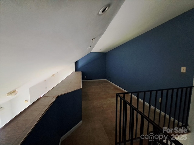 2527 Carya Pond Ln, Charlotte, NC 28212 - bonus room featuring baseboards, carpet, and vaulted ceiling