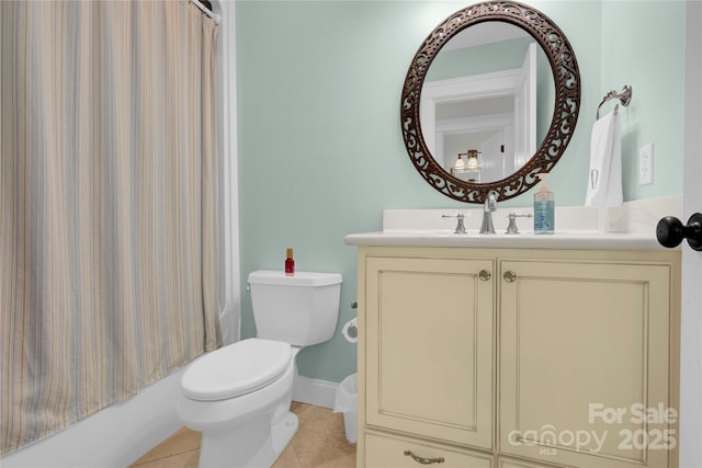 full bath with shower / tub combo with curtain, vanity, tile patterned flooring, and toilet