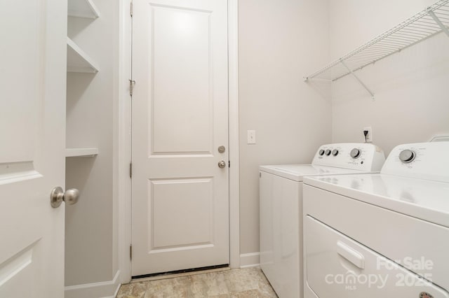 5684 Garrow Glen Rd Unit 96, Charlotte, NC 28278 - laundry room featuring baseboards, laundry area, and washer and clothes dryer