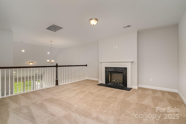 5684 Garrow Glen Rd Unit 96, Charlotte, NC 28278 - unfurnished living room featuring baseboards, visible vents, and carpet flooring
