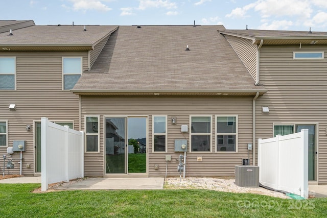 5684 Garrow Glen Rd Unit 96, Charlotte, NC 28278 - rear view of property featuring a patio area, a shingled roof, fence, a yard, and central AC unit