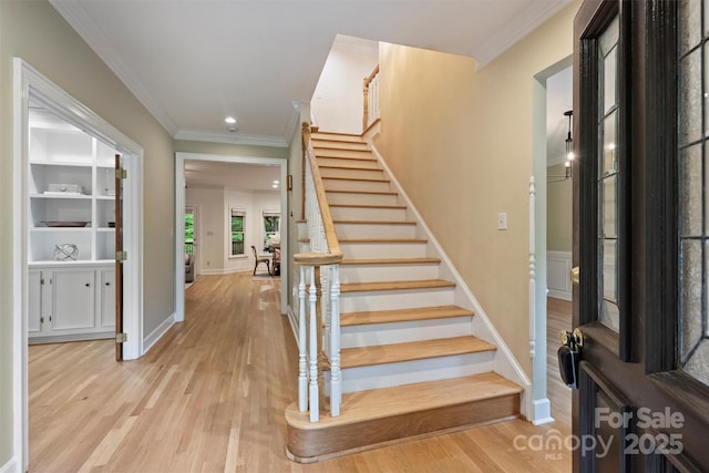 7067 Rocky Falls Rd, Charlotte, NC 28211 - stairs with wood finished floors, ornamental molding, baseboards, and recessed lighting