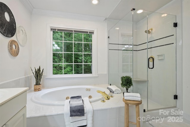 7067 Rocky Falls Rd, Charlotte, NC 28211 - bathroom with a shower stall, healthy amount of natural light, a jetted tub, vanity, and crown molding