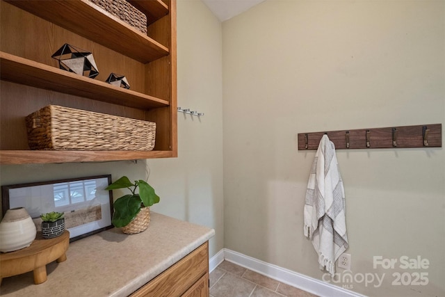 7067 Rocky Falls Rd, Charlotte, NC 28211 - mudroom with baseboards and light tile patterned flooring