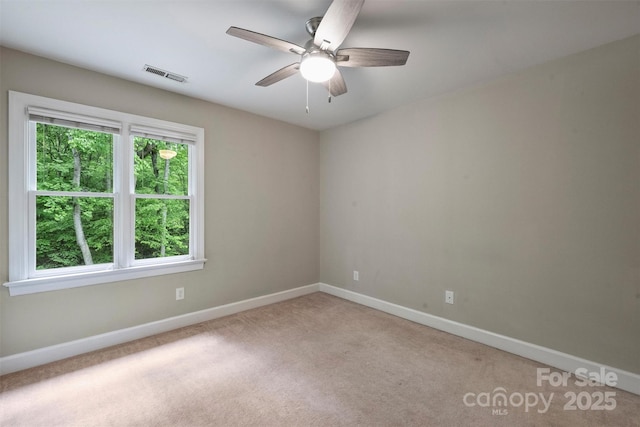 7067 Rocky Falls Rd, Charlotte, NC 28211 - unfurnished room featuring ceiling fan, baseboards, and light colored carpet