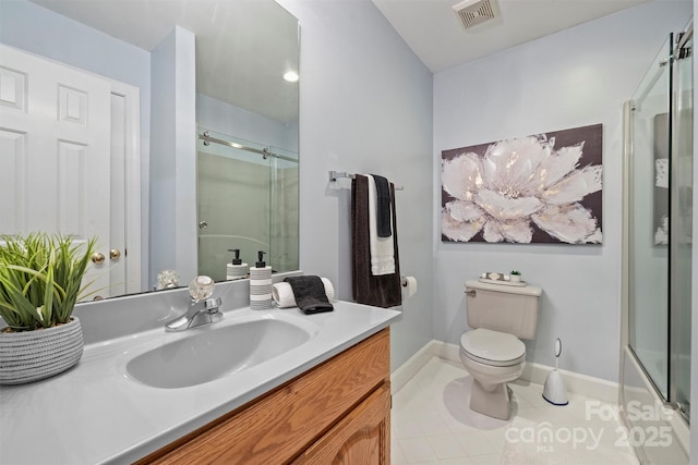 7067 Rocky Falls Rd, Charlotte, NC 28211 - bathroom featuring toilet, vanity, tile patterned flooring, and baseboards