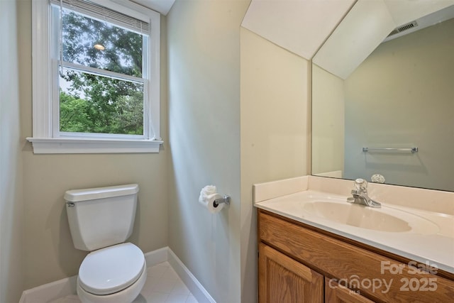 7067 Rocky Falls Rd, Charlotte, NC 28211 - bathroom featuring baseboards, plenty of natural light, toilet, and vanity