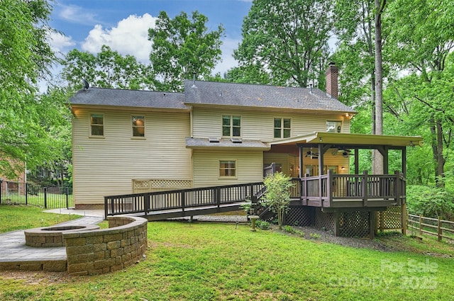 7067 Rocky Falls Rd, Charlotte, NC 28211 - rear view of house featuring a wooden deck, a chimney, a ceiling fan, and an outdoor fire pit