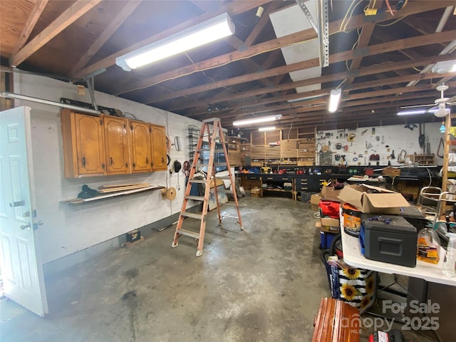 garage with a workshop area