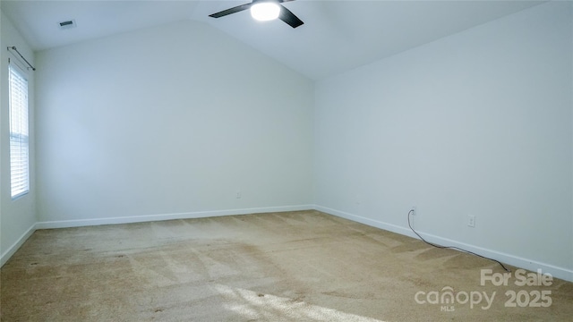 empty room featuring carpet flooring, visible vents, baseboards, and a ceiling fan