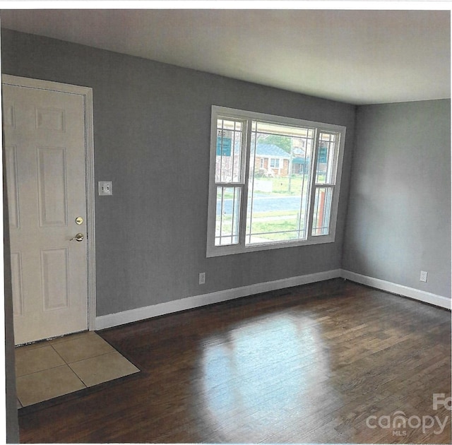 2831 Denview Ln, Charlotte, NC 28208 - entrance foyer featuring dark wood-style floors and baseboards