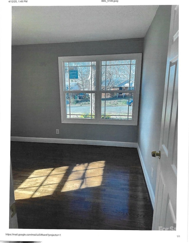 2831 Denview Ln, Charlotte, NC 28208 - spare room with dark wood finished floors