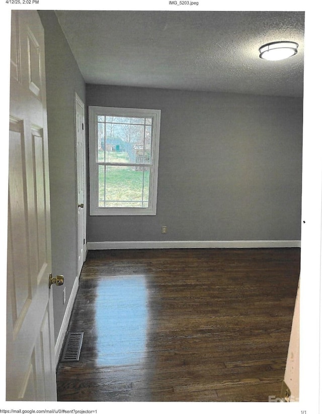 2831 Denview Ln, Charlotte, NC 28208 - empty room featuring wood finished floors and baseboards