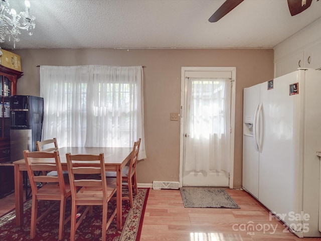 6820 Elm Forest Dr, Charlotte, NC 28212 - dining area featuring light wood-type flooring and a ceiling fan