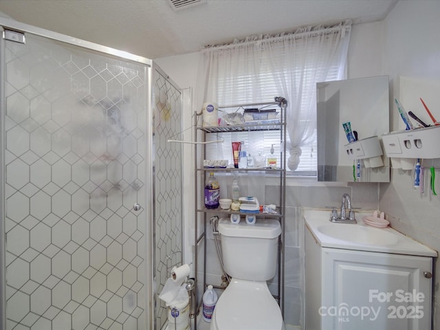 6820 Elm Forest Dr, Charlotte, NC 28212 - bathroom with toilet, a shower stall, and vanity