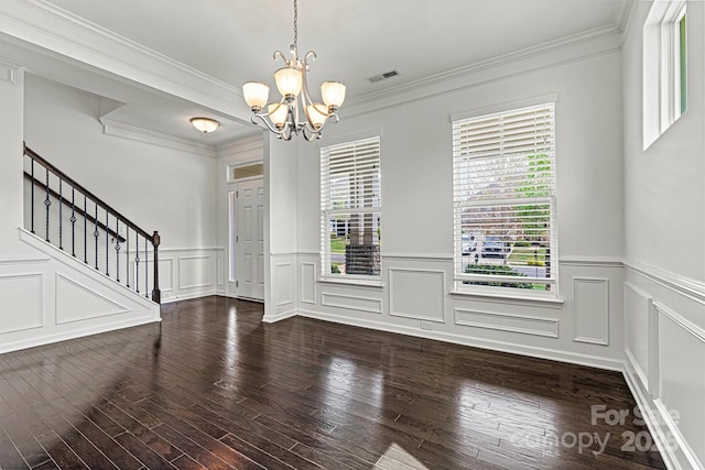 1617 Post Ct, Gastonia, NC 28054 - unfurnished dining area with dark wood-style floors, an inviting chandelier, stairway, crown molding, and visible vents