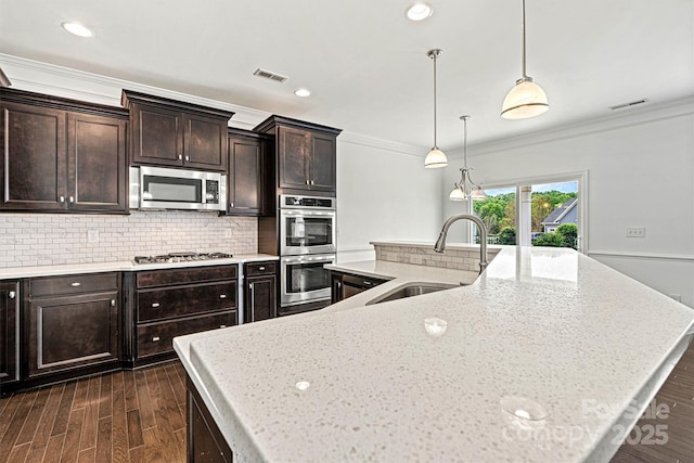 1617 Post Ct, Gastonia, NC 28054 - kitchen with visible vents, stainless steel appliances, a center island with sink, and a sink