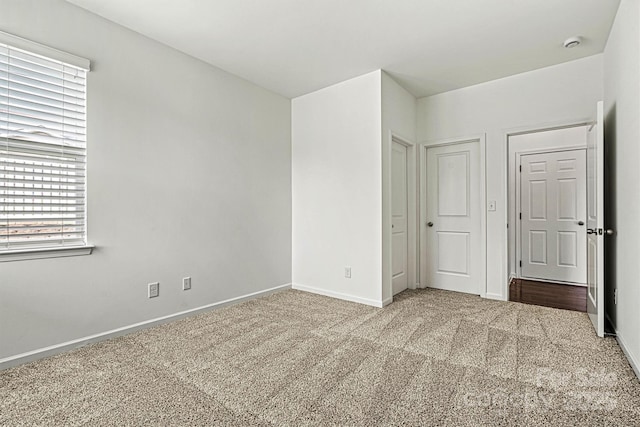1617 Post Ct, Gastonia, NC 28054 - unfurnished bedroom featuring baseboards and carpet floors