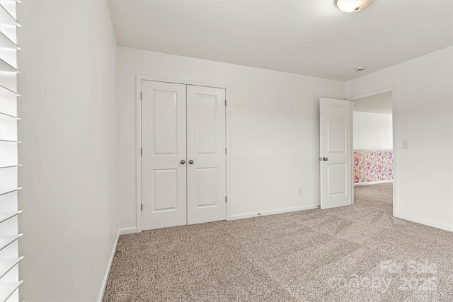 1617 Post Ct, Gastonia, NC 28054 - unfurnished bedroom featuring carpet, a closet, and baseboards