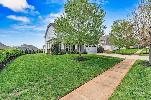 1617 Post Ct, Gastonia, NC 28054 - view of property hidden behind natural elements featuring fence, a front lawn, and concrete driveway