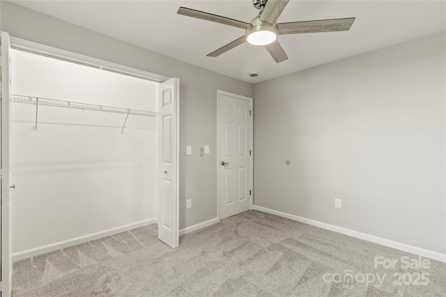 109 W Poplar St, Stanley, NC 28164 - unfurnished bedroom with baseboards, a ceiling fan, a closet, and carpet flooring